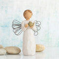Willow Tree Angel of the Kitchen, 5.5”h hand-painted standing resin figure in cream dress with wire wings, holding green teapot, in front of sky blue painting